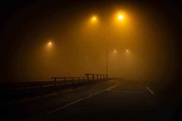 istock Road trip at foggy night 1124954698