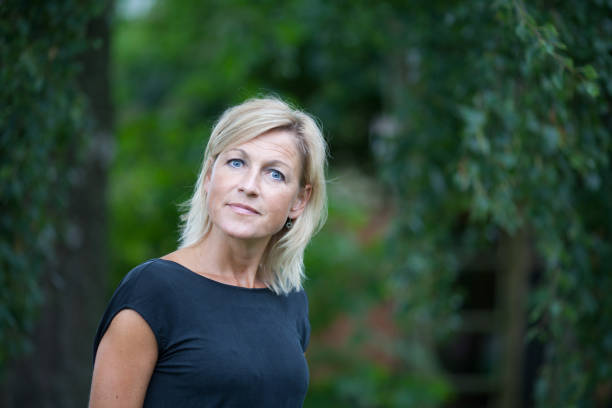 istock blond woman portrait 1124954703