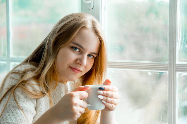 istock Sick young woman with cold and flu at home 1124957844