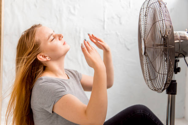 istock Sick young woman with cold and flu at home 1124958038