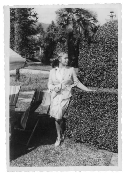 istock Young Woman in Public Park, 1941 1124958507