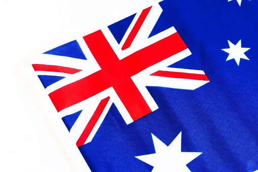 A close up shot of an Australian national flag on white background.