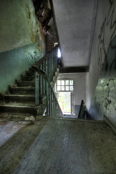 istock Ubex (urban exploration): Staircase in an abandoned house (HDR) 1124959423