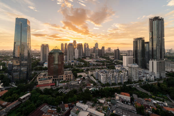 istock Dramatic sunset over Jakarta business district skyline in Indonesia. 1124959665