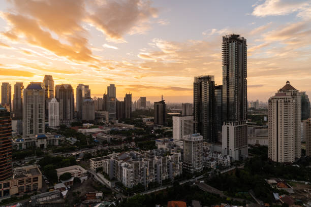 istock Dramatic sunset over Jakarta business district skyline in Indonesia. 1124959693