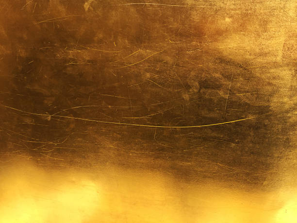 istock Gold abstract background or texture distress  scratch and gradients shadow 1124960173