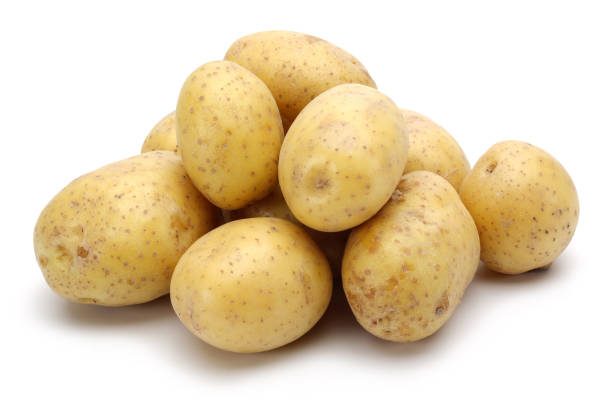 istock Heap of fresh potatoes on white background 1124972801