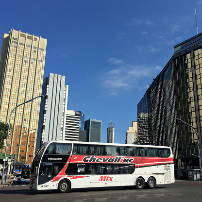 Buenos Aires, Argentina - January 23, 2019: Big double decker bus moving through the city. This area is next to the terminal where hundreds of people arrive from the interior provinces to the big city