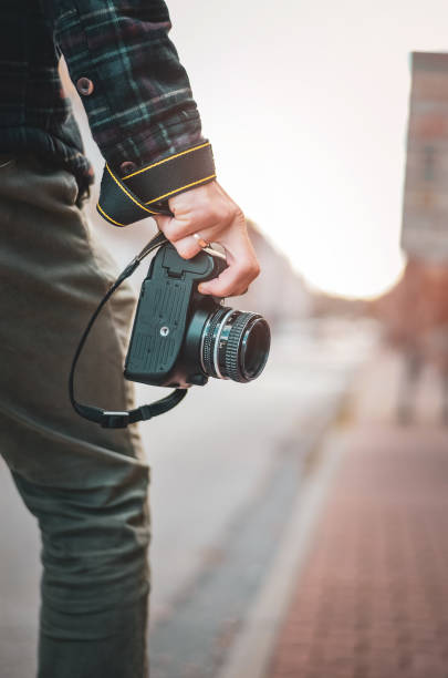 istock Man hipster with retro photo camera 1124976989