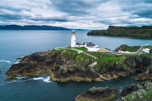 Aerial view of the Fanad Head Lighthouse located on the north coast of County Donegal in Ireland.