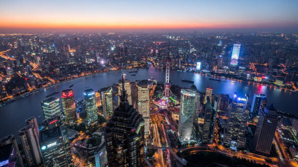 istock Shanghai skyline and cityscape at sunset 1124987128