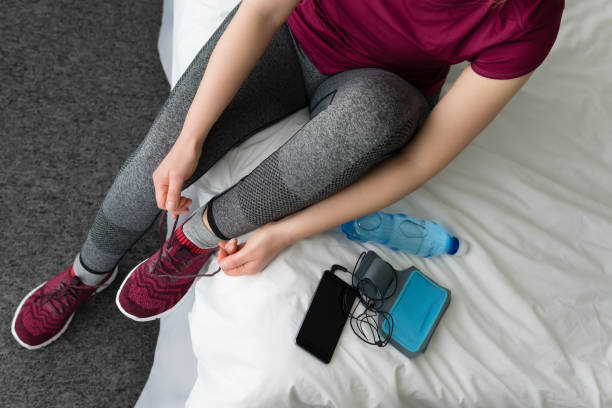 Woman getting ready for morning run. Concept sports.