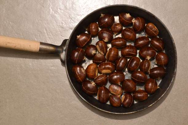 istock particular view from above of pan with roasted chestnuts 1124993728