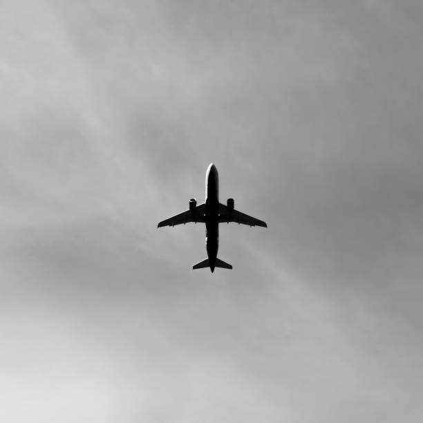 istock Airplane is flying above close to the ground 1124993944