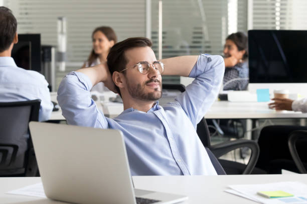 istock Employee resting with closed eyes in coworking office 1124997398