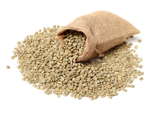 istock Green and roasted coffee beans isolated on white background 1124997877