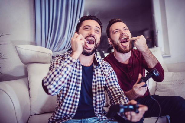 istock Brothers Having Fun And Playing Video Games Together 1124998588