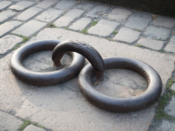 Old iron mooring rings on the pavement of Nyhavn area in Copenhagen, Denmark