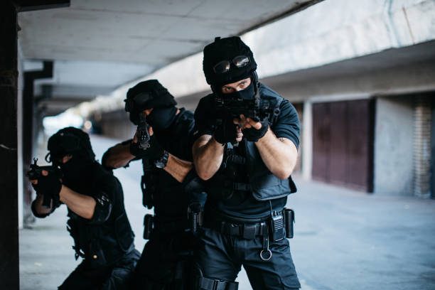 istock Armed police force in action 1125007340