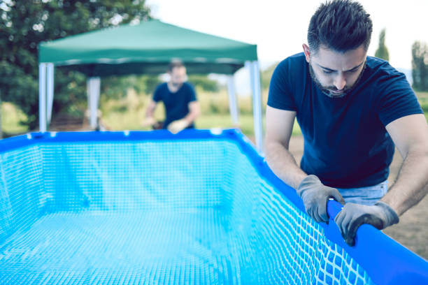 istock Preparing Yard Pool For My Kids 1125015983