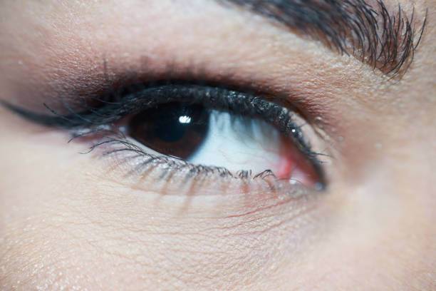 istock Close-Up Analyzing Brown Woman Eye With Beautiful Mascara Makeup 1125017681