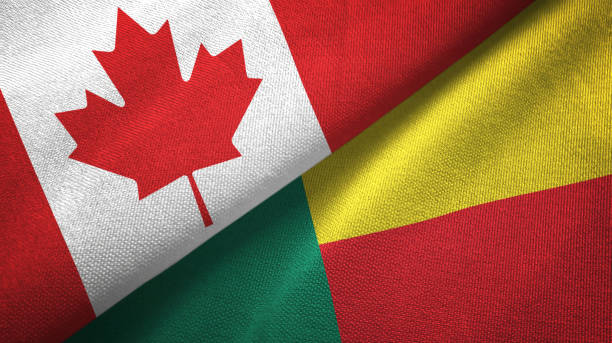 istock Benin and Canada two flags together textile cloth, fabric texture 1125020187