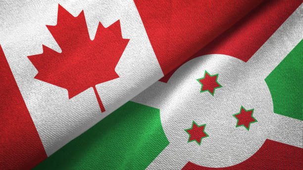 istock Burundi and Canada two flags together textile cloth, fabric texture 1125020217