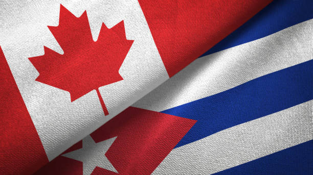 istock Cuba and Canada two flags together textile cloth, fabric texture 1125020279