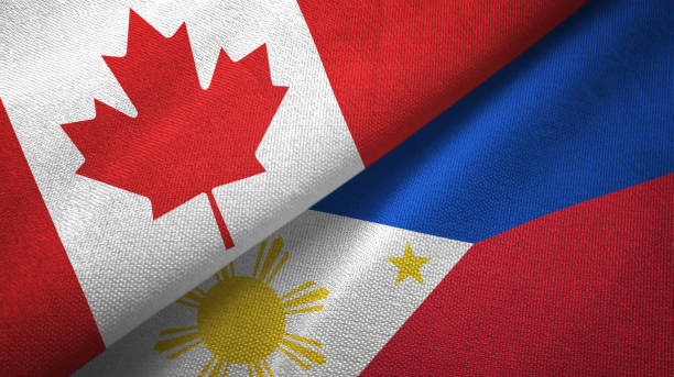 istock Philippines and Canada two flags together textile cloth, fabric texture 1125020655