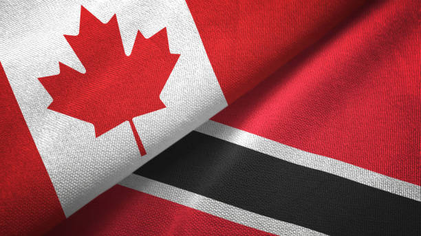istock Trinidad and Tobago and Canada two flags together textile cloth, fabric texture 1125021834