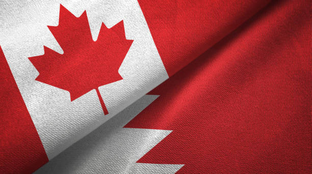 istock Bahrain and Canada two flags together textile cloth, fabric texture 1125024152