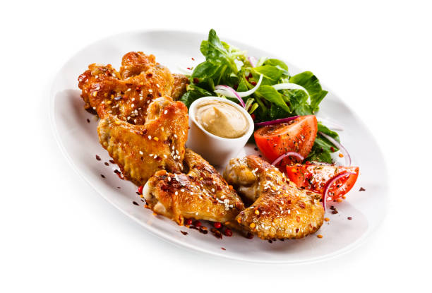 istock Grilled chicken wings on white background 1125024574