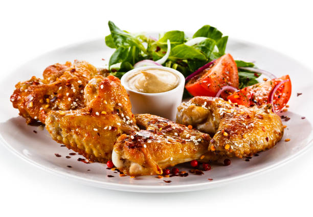 istock Grilled chicken wings on white background 1125024585