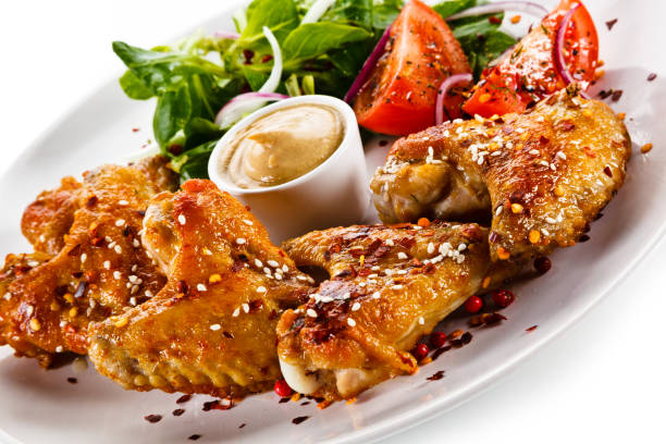 istock Grilled chicken wings on white background 1125024629