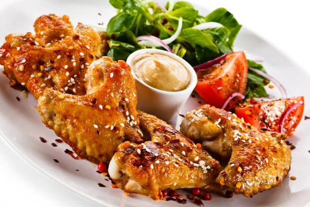 istock Grilled chicken wings on white background 1125024679