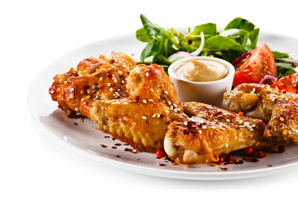 istock Grilled chicken wings on white background 1125024752