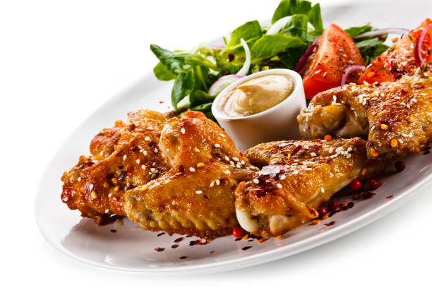 istock Grilled chicken wings on white background 1125024792