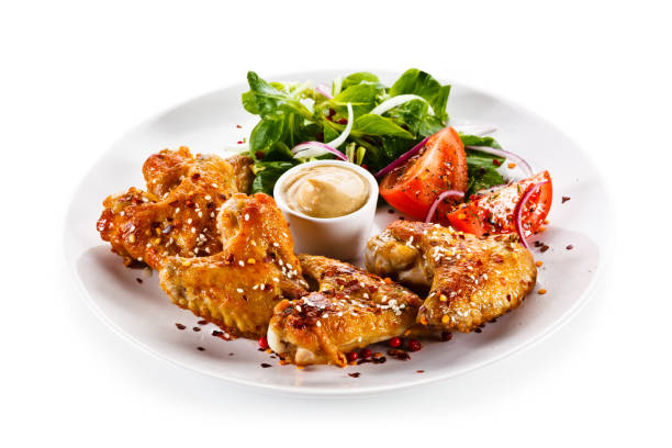 istock Grilled chicken wings on white background 1125024829