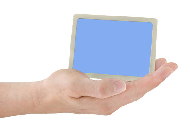 istock Male hand holding card isolated on white background 1125026197