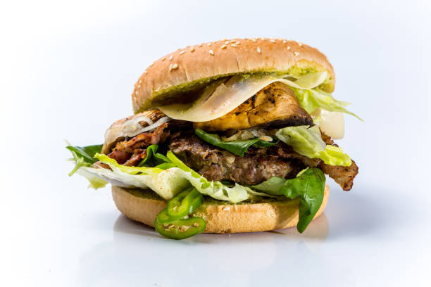 istock tasty burger with cheese and vegetables 1125026799
