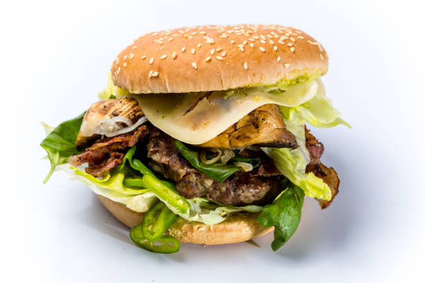 istock tasty burger with cheese and vegetables 1125026812