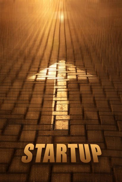 istock Startup concept with arrow. Startup word written on road at the sunset 1125034712