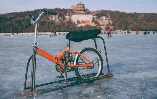 Prague,Czech Republic,August 5,2023. A vintage bicycle of the well-known America Beverage is parked in front of a cafe to attract customers. The red color catches the eye.