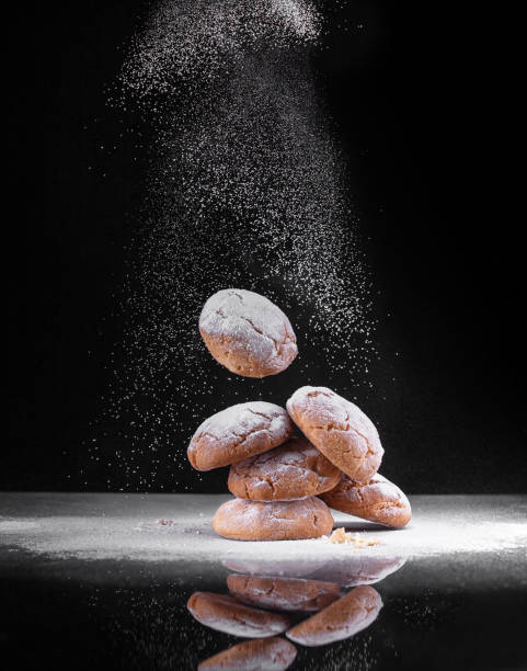 istock cookies with powdered sugar on a black background 1125036951