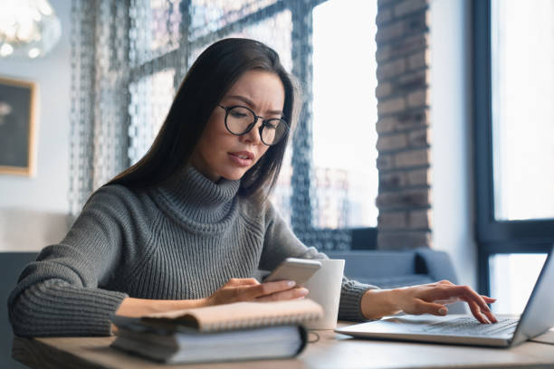 Business woman busy working on laptop computer at office