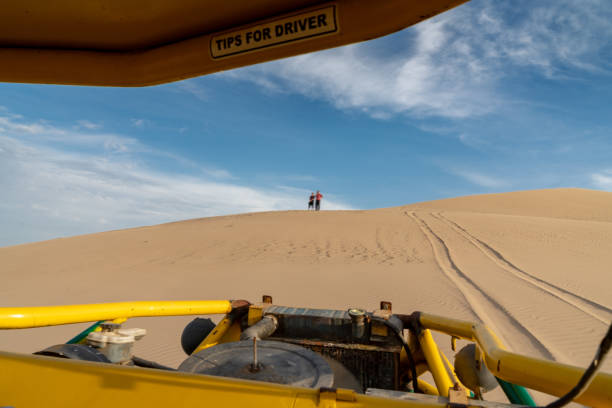 istock Beach buggy on sand dunes in Huacachina, Peru 1125053064