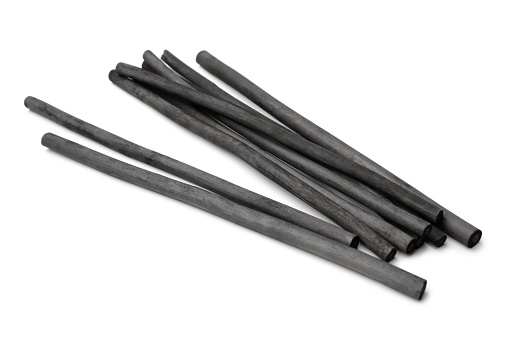 Charcoal sticks on white background