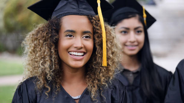istock Happy young woman during college graduation ceremony 1125055152