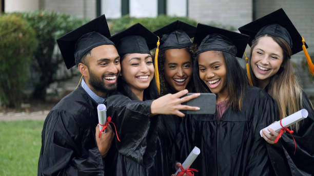 istock Diverse group of college grads take selfie 1125055198