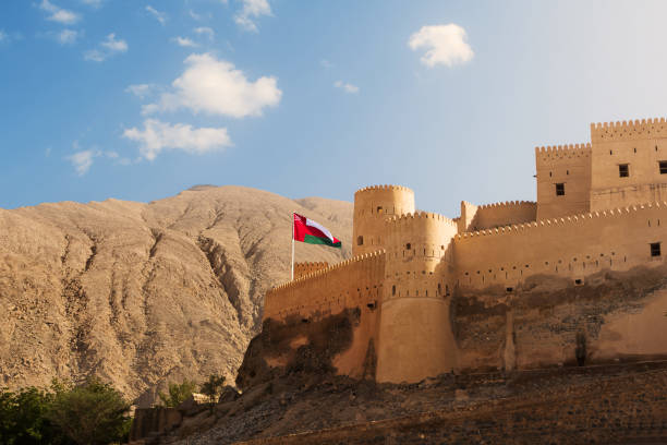 istock Ancient Fort of Nakhal with flag (Oman) 1125057054